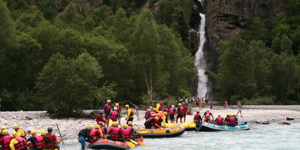 White water rafting heading to waterfall for dunking